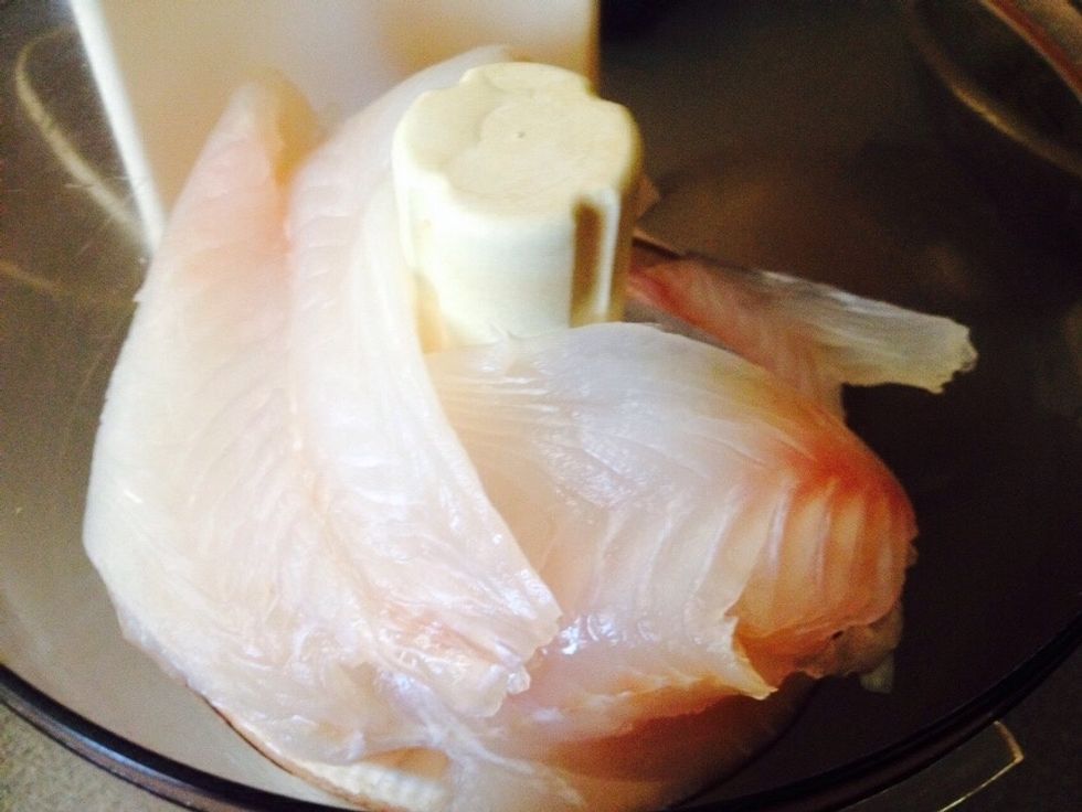 Add the white fish flesh in a food processor. Pulse.