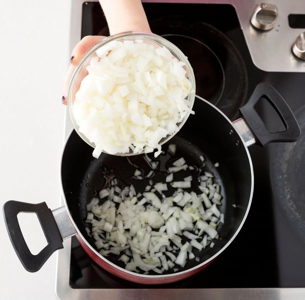 Once the oil is hot, throw in your onions.