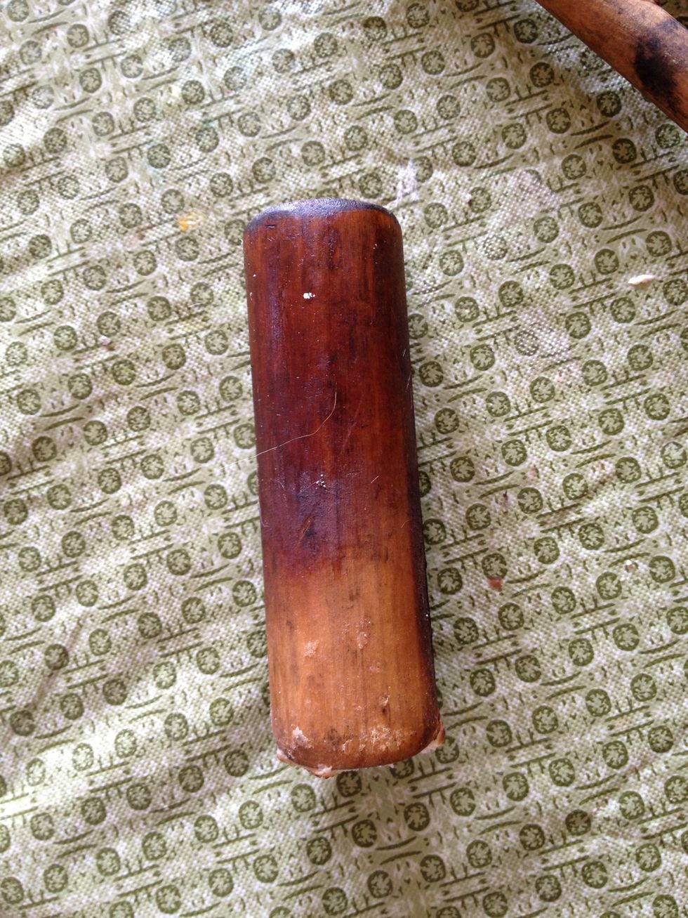 1-1/4 inch round dowel not attached to smaller dowel.