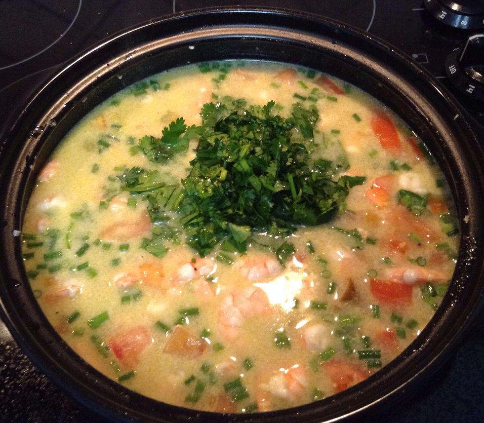 1/2 cup cilantro into the soup pot.