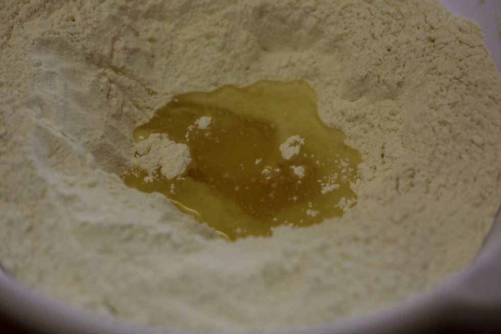 1/2 cup of vegetable oil or olive oil. 3/4 cup of warm water. Now remember to add the water a little at a time and use your hands to mix the dough to a smooth shiny consistency. Leave for a few hours.