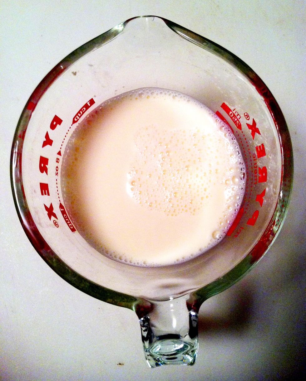 1/2 cup of very cold milk - any type.  (All the ingredients are chilled adding because ice dilutes the flavor and consistency.)