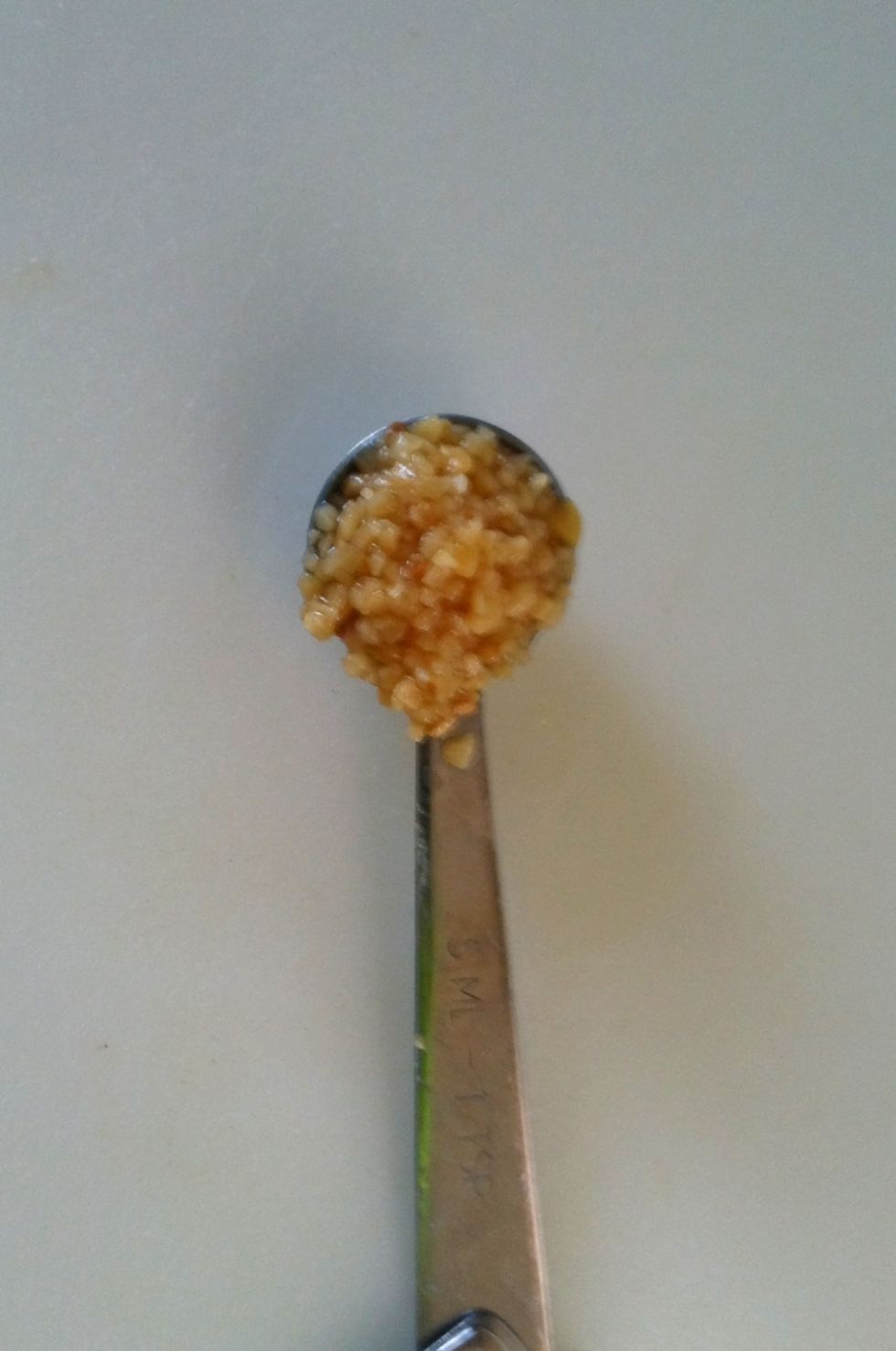 1/2 teaspoon of garlic - fresh or bottled.