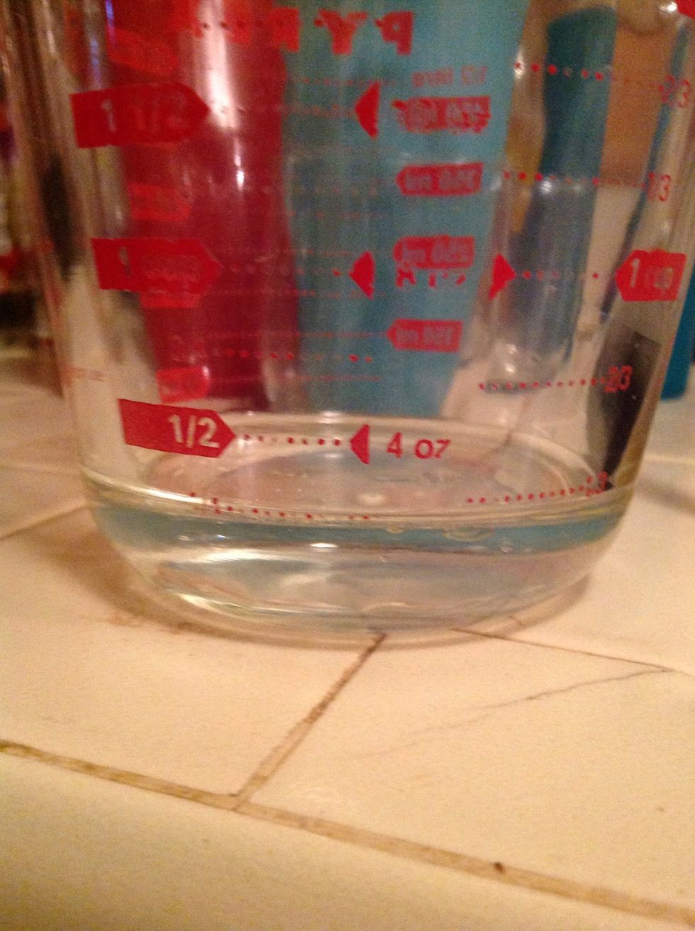 1/3 cup of water. Measure at eye level.