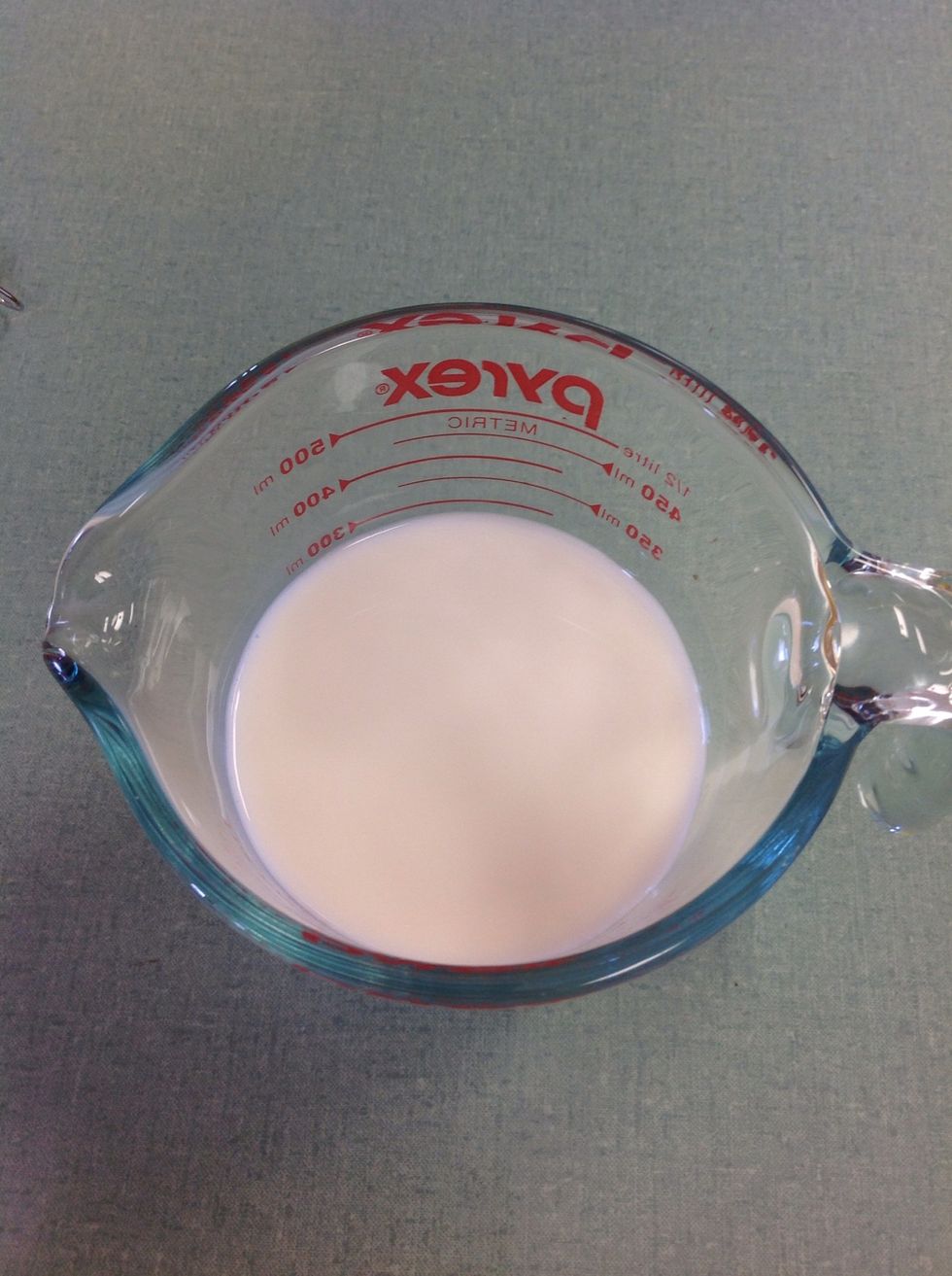 1/4 cup milk. Add flour, cocoa, and milk to your mixture. Beat until blended. Stir in pecans. Add mixture to greased pan.