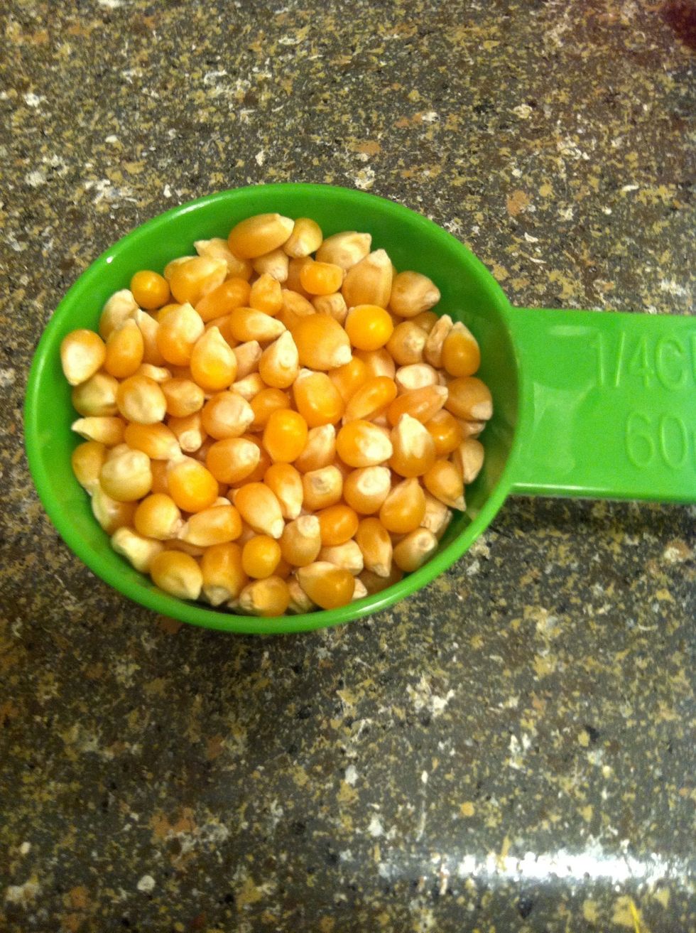 1/4 cup of unpopped corn is enough for two servings. Or one large serving.