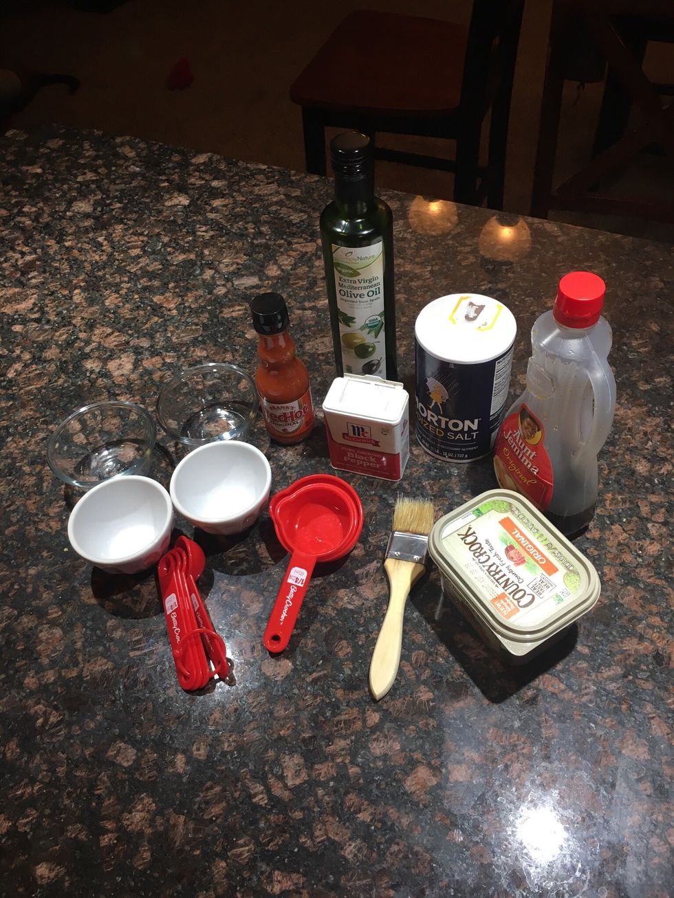 1/4 tsp of Iodized Salt - 1/4 tsp of Black Pepper - Olive Oil (Enough to drizzle chicken) - Franks Hot Sauce - Original Syrup - Original Salted Spread Butter - Chicken Wings (About a Family serving)