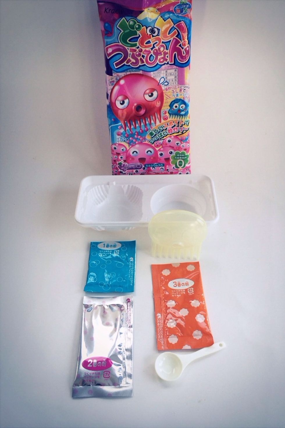 #1 Blue Jelly Orb Activator Packet #2 Pink Jelly Orb Packet #3 Orange Foaming Pudding Packet #4 Water Scoop #5 Mixing Tray #6 Octopus Jelly Orb Making Squeezer