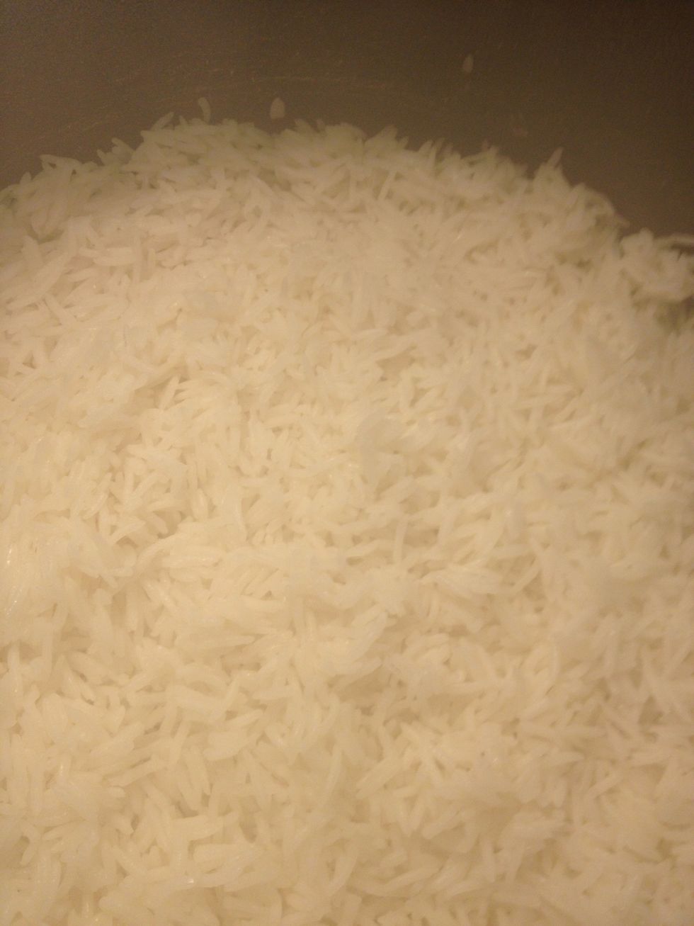 1 cup if basmati rice for cooking add two cups of water and let it boil until it dry them put the stove in low tem until it get cook take around 10-15 min max