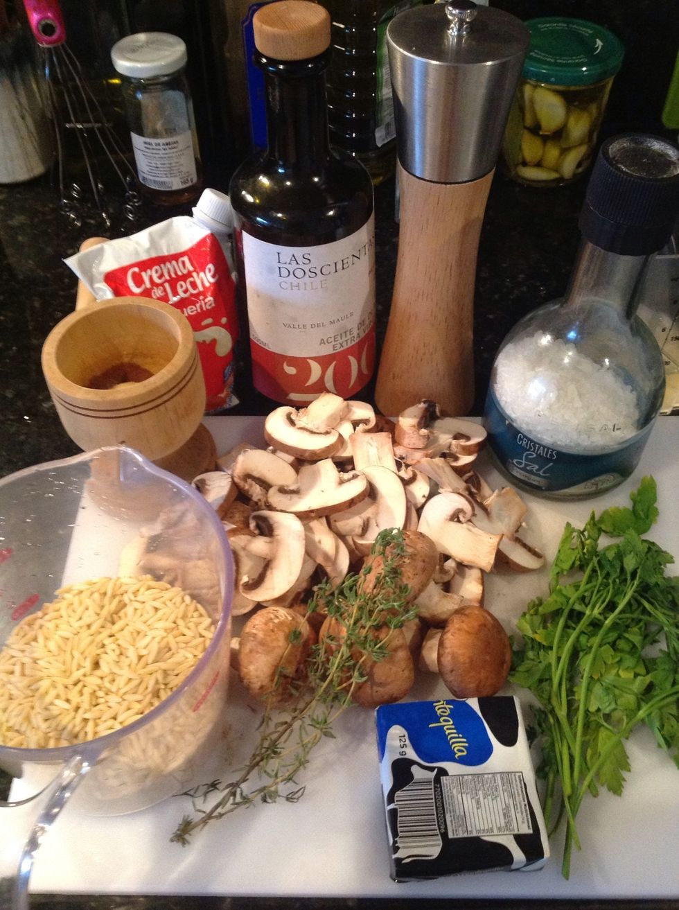 1 cup rissoni (orzo), 2 cups of crimini  mushrooms sliced, thyme, butter, parsley, olive oil, 1/2 cup of buttermilk, minced garlic,  salt and pepper