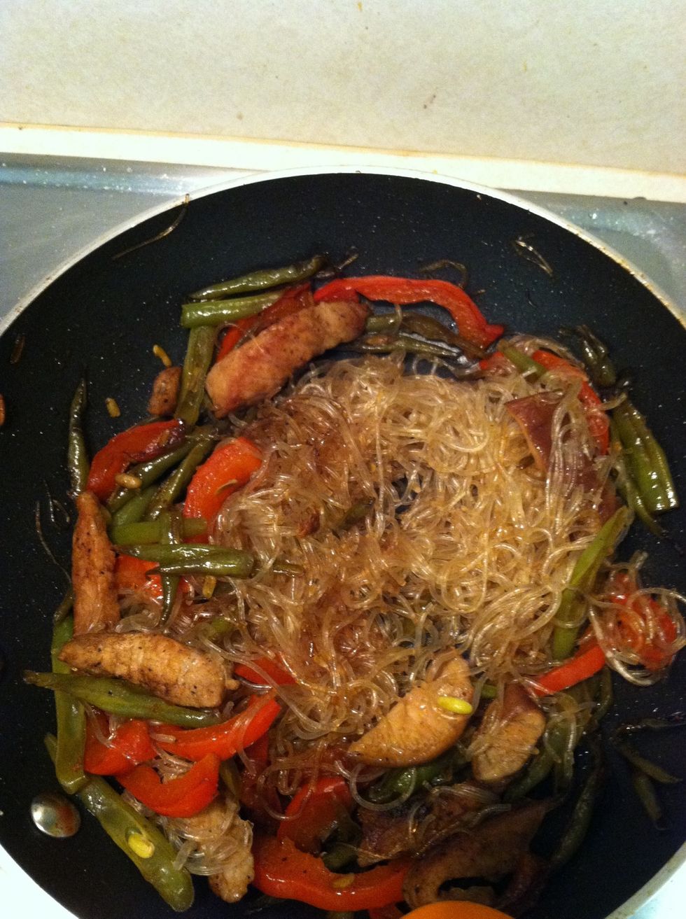 1. cut the Shiitake in strips 2. Add the noodles and the Shiitake to the pan. 3. Add a little bit of soy sauce to give it flavor and color. 4. Let it cook for 5 min at low heat.
