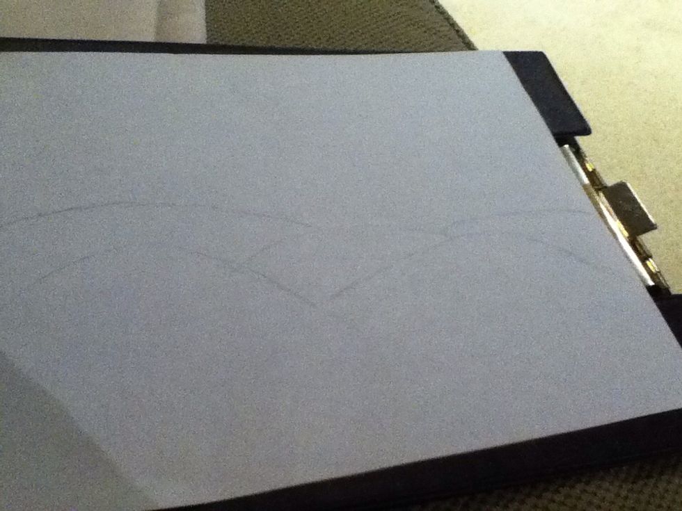 1.) Draw a couple mountains in pencil, connected to each oter like this\u2b06