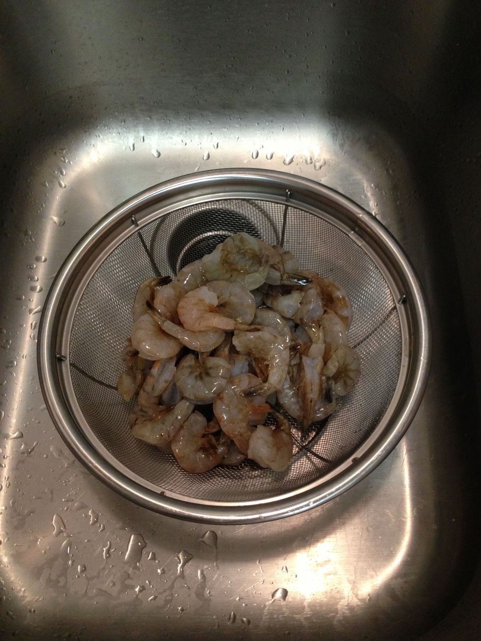 1 lb raw shrimp from fish market. Wash with cold water & peel. If not already deveined, do now with prep knife.