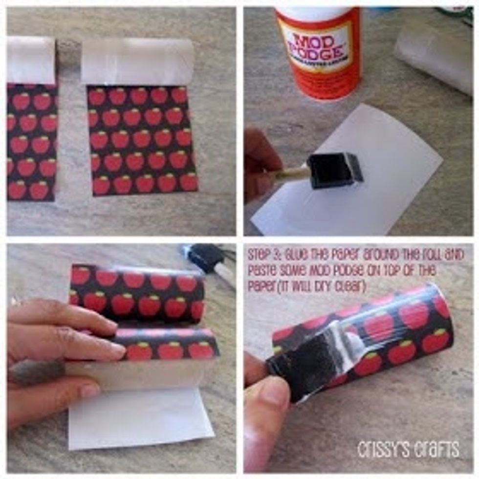 1.Measure a piece of paper to the size of your toilet paper roll. 2.Mod Podge the back of your paper and stick it to the roll. 3.Mod Podge the outside.