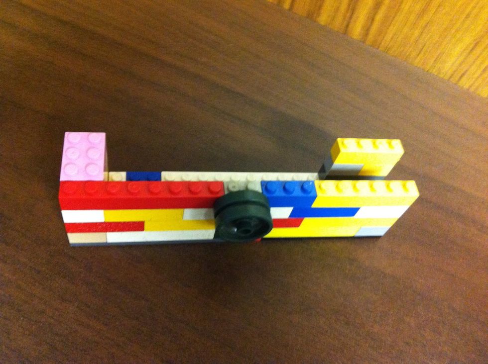 1 pink 3x2| 1 red 8x1| 1 green wheel| 1 grey 2x1 half size| 1 blue 3x1| 1 yellow 6x1| 1 yellow 4x1 full sized