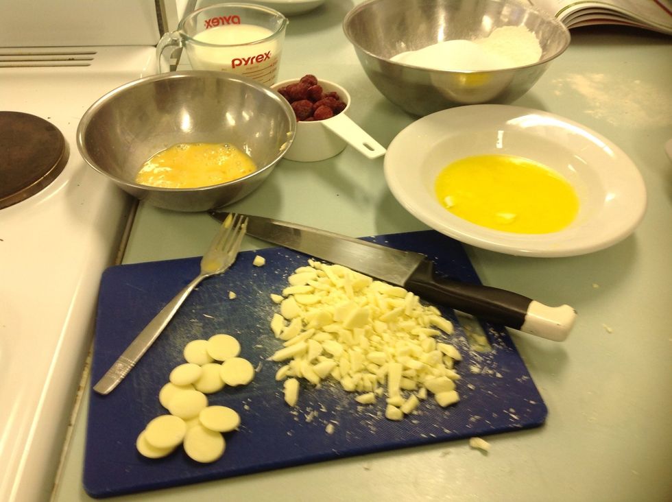 1) Preheat oven to 180 degrees celsius. 2) Grease muffin trays (Makes approximately 12) 3) Chop choc bits finely 4) Combine flour, sugar and the chopped chocolate in a bowl.