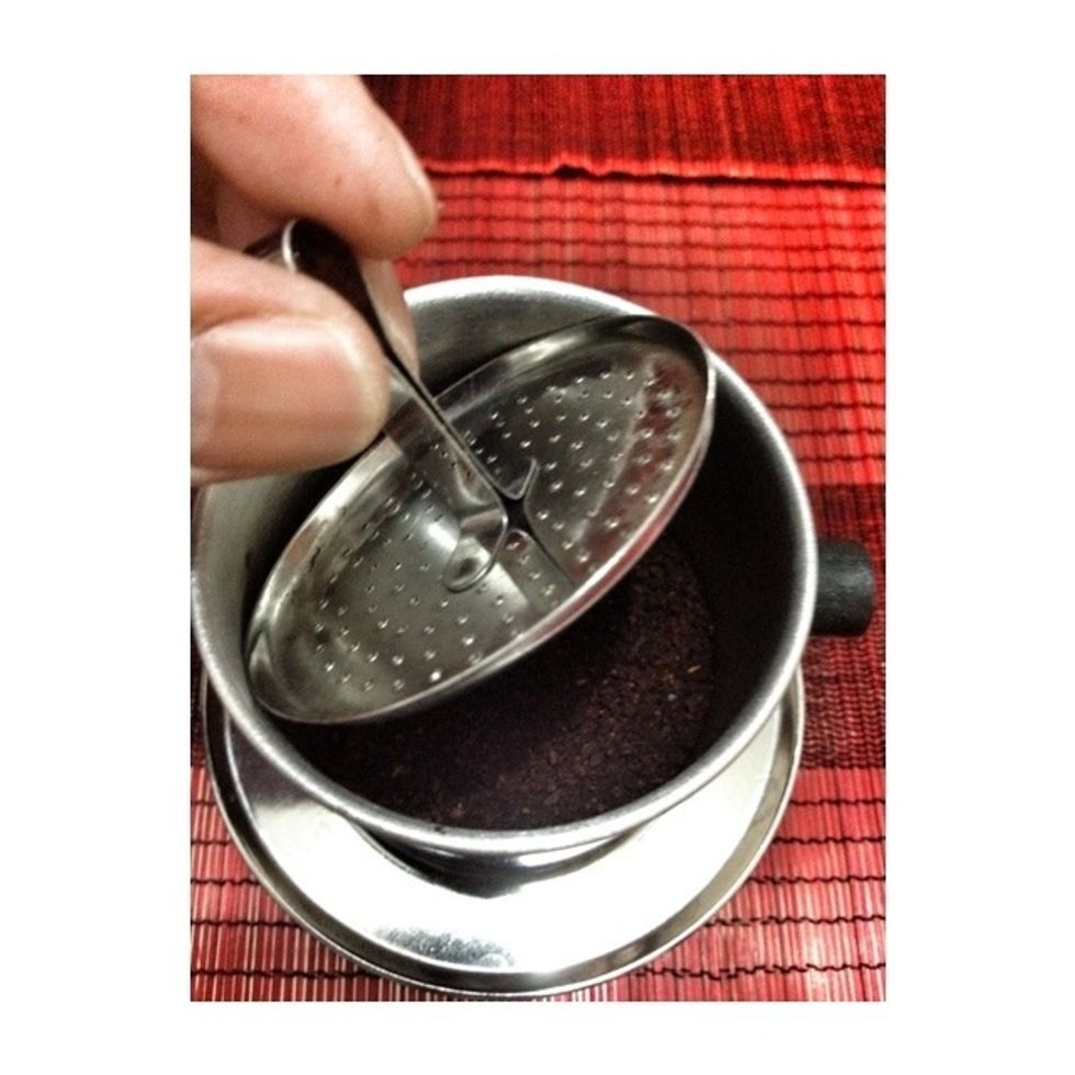 1. Put the filter cup, and press it a little...do not press too hard.. 2. Add a little bit Sweat Milk at the glass