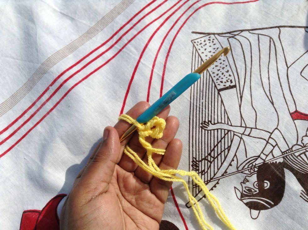 1 sc into the loop, chain 4.  Work another *sc into the loop and chain 4*, repeat this step six more times.