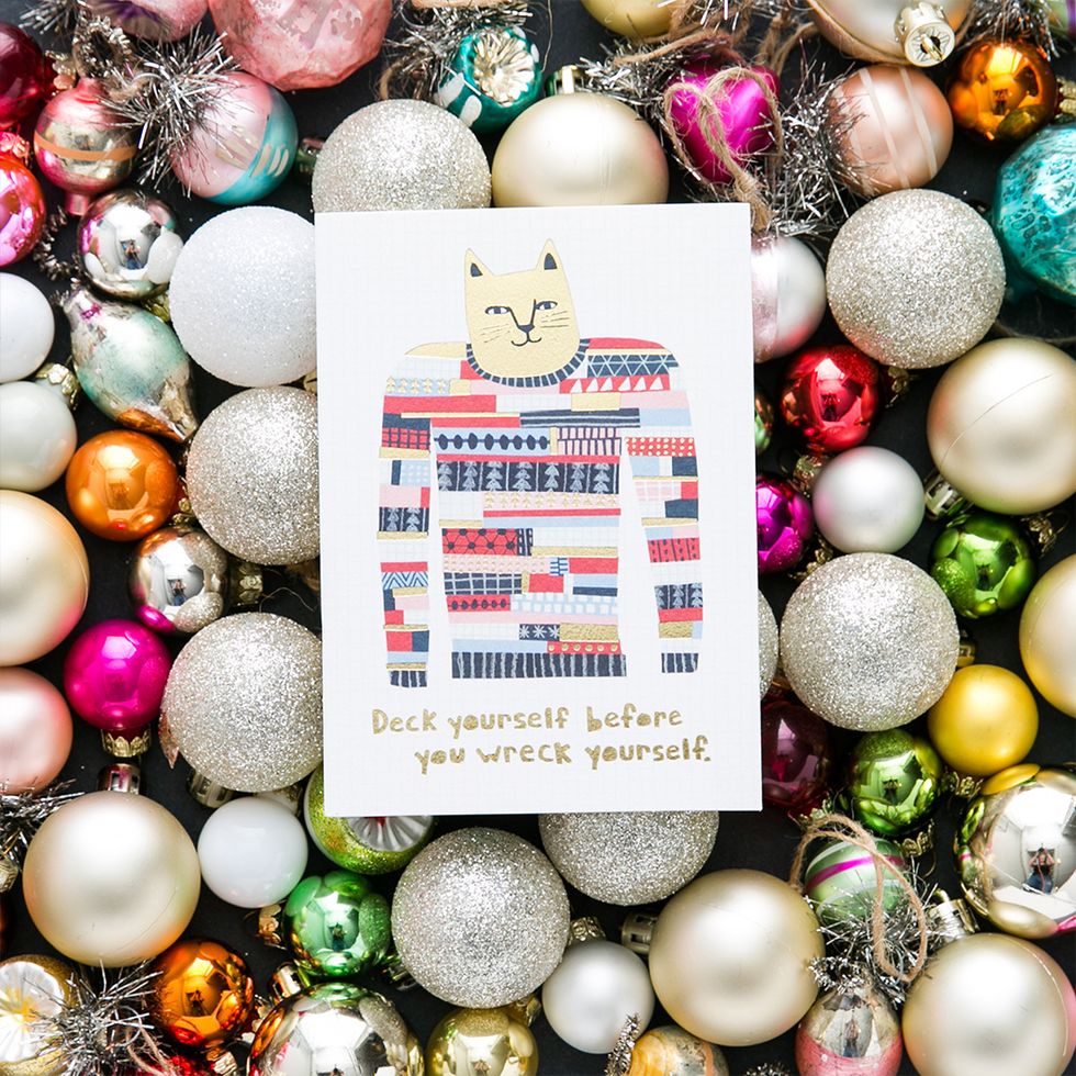 1. Share a smile with the cat lover in your life. This card kills it on two fronts\u2014 crazy cats *and* ugly sweaters. It\u2019s beyond words. http://bit.ly/2fAvOvV