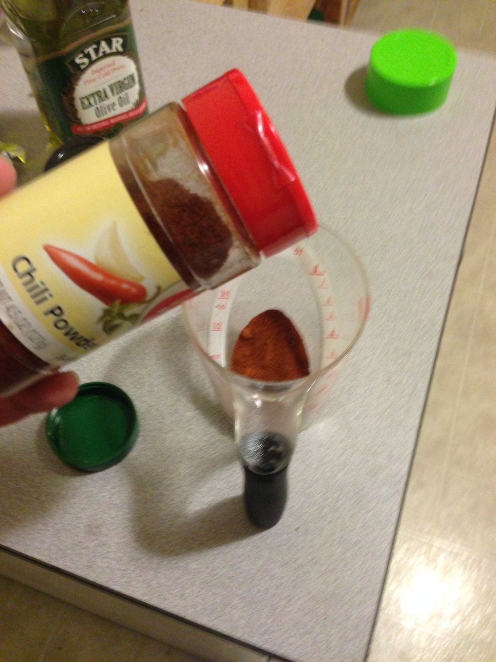 1 tbsp of chili powder. If you like spicy, you can also add cayenne pepper to taste. 1-2 tsp would taste great.