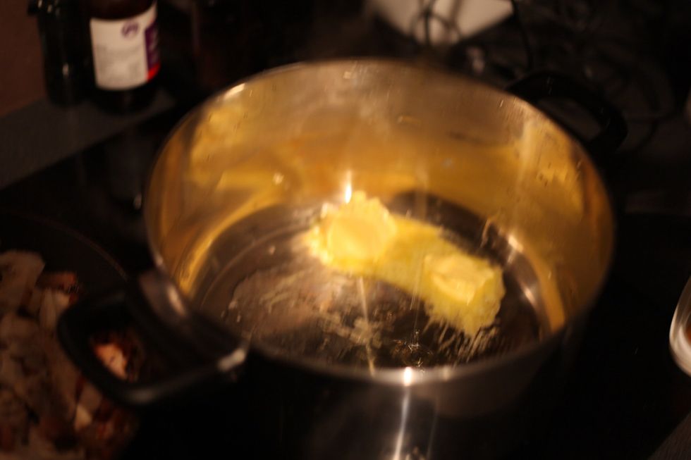 1 tbsp of Olive oil and butter. Let the butter melt slowly. If you burn your pot I'm not scrubbing it. Medium heat.