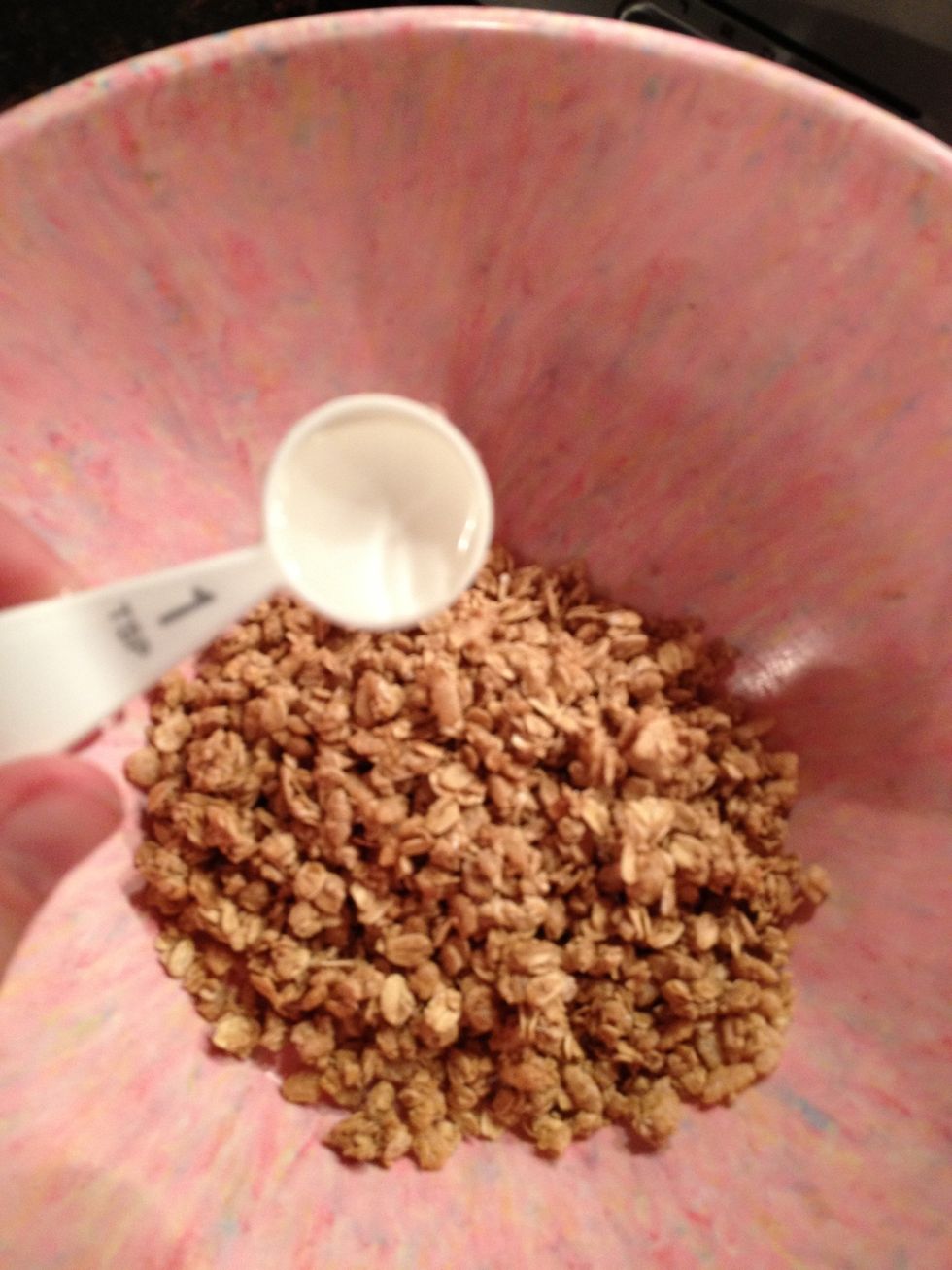 1 teaspoon of water. Make sure it gets mixed well into the granola.