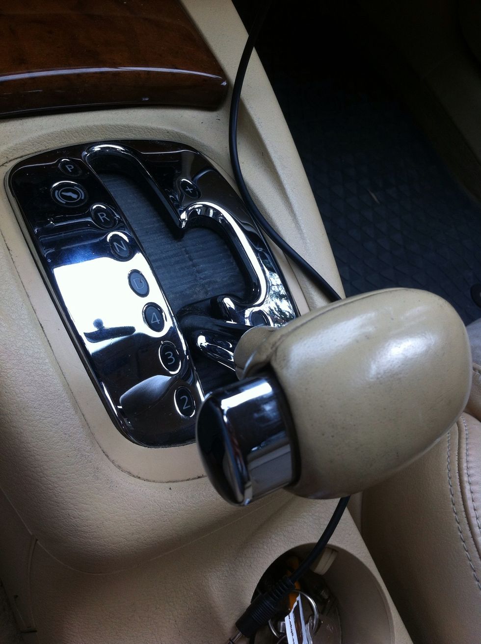 1. Turn the key until you can put the shifter in 3rd gear.