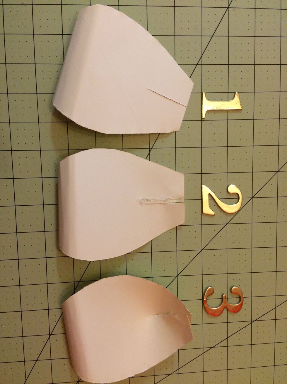 1) Your petal flipped on the opposite side 2) Place hot glue in the middle of 2" slit. Do place glue along entire slit because it will be an excessive amount of glue 3) Overlap should create a dip