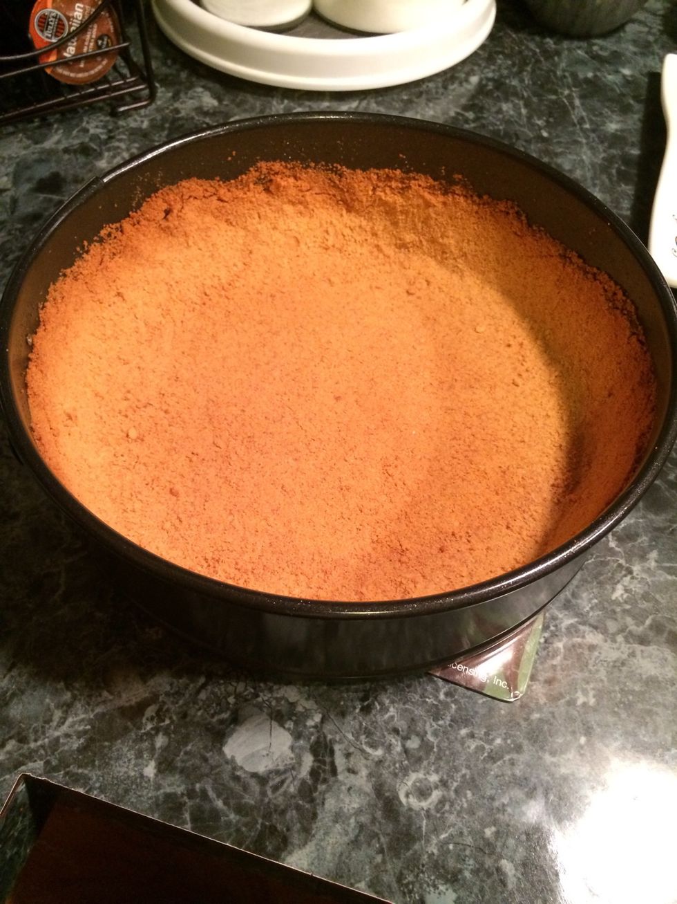 10 minutes have passed, time to remove the springform pan from the oven. Let it cool. Drop the oven temp to 325 degrees as well\ud83d\ude09