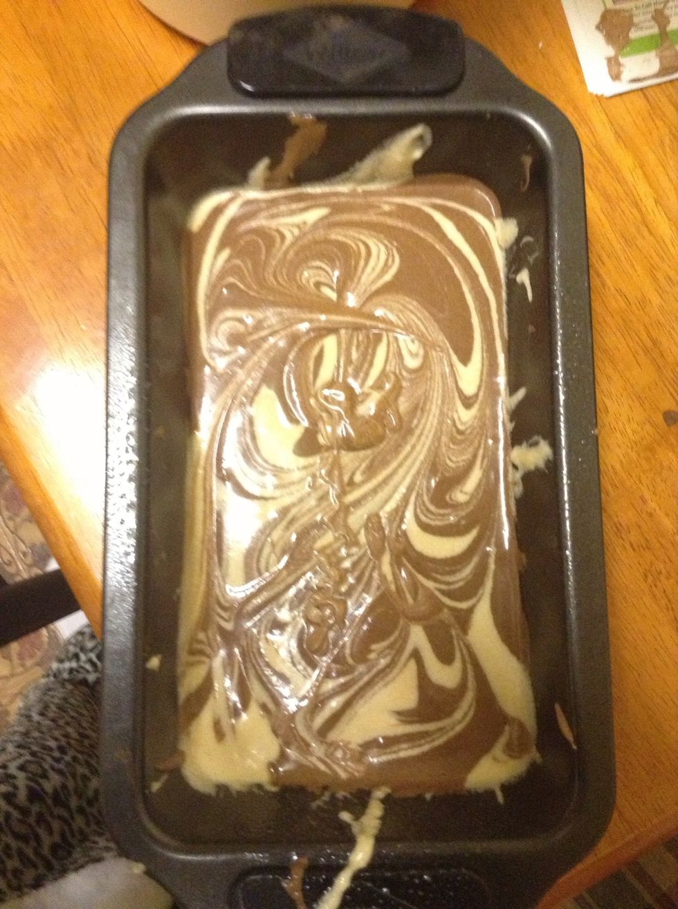 10.) When layered and all mixture is used, get out a wooden mixing spoon / spatula, and twirl it around in the checkered mixture, creating any pattern you desire