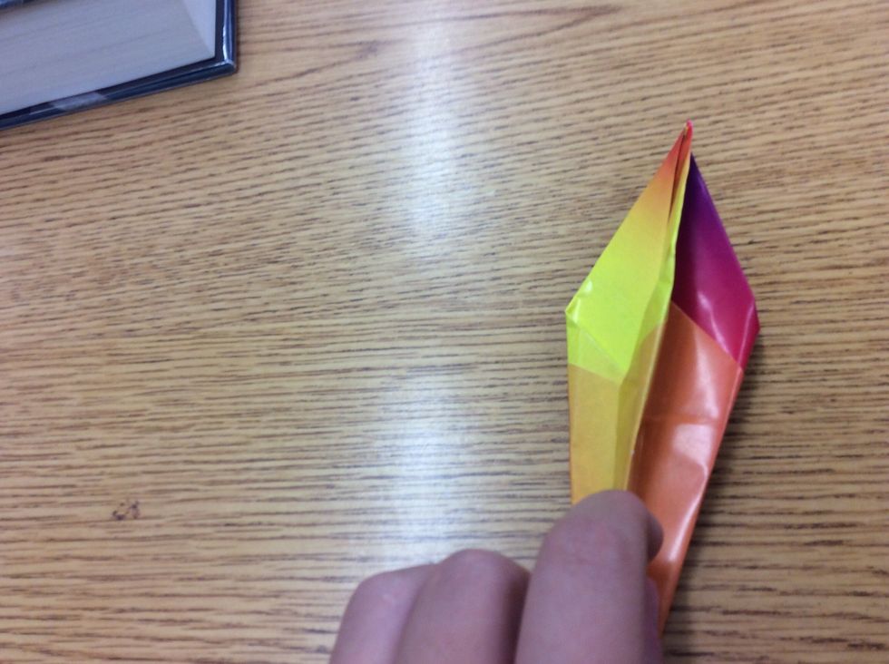 11. Take the right side and flip it over to the left.