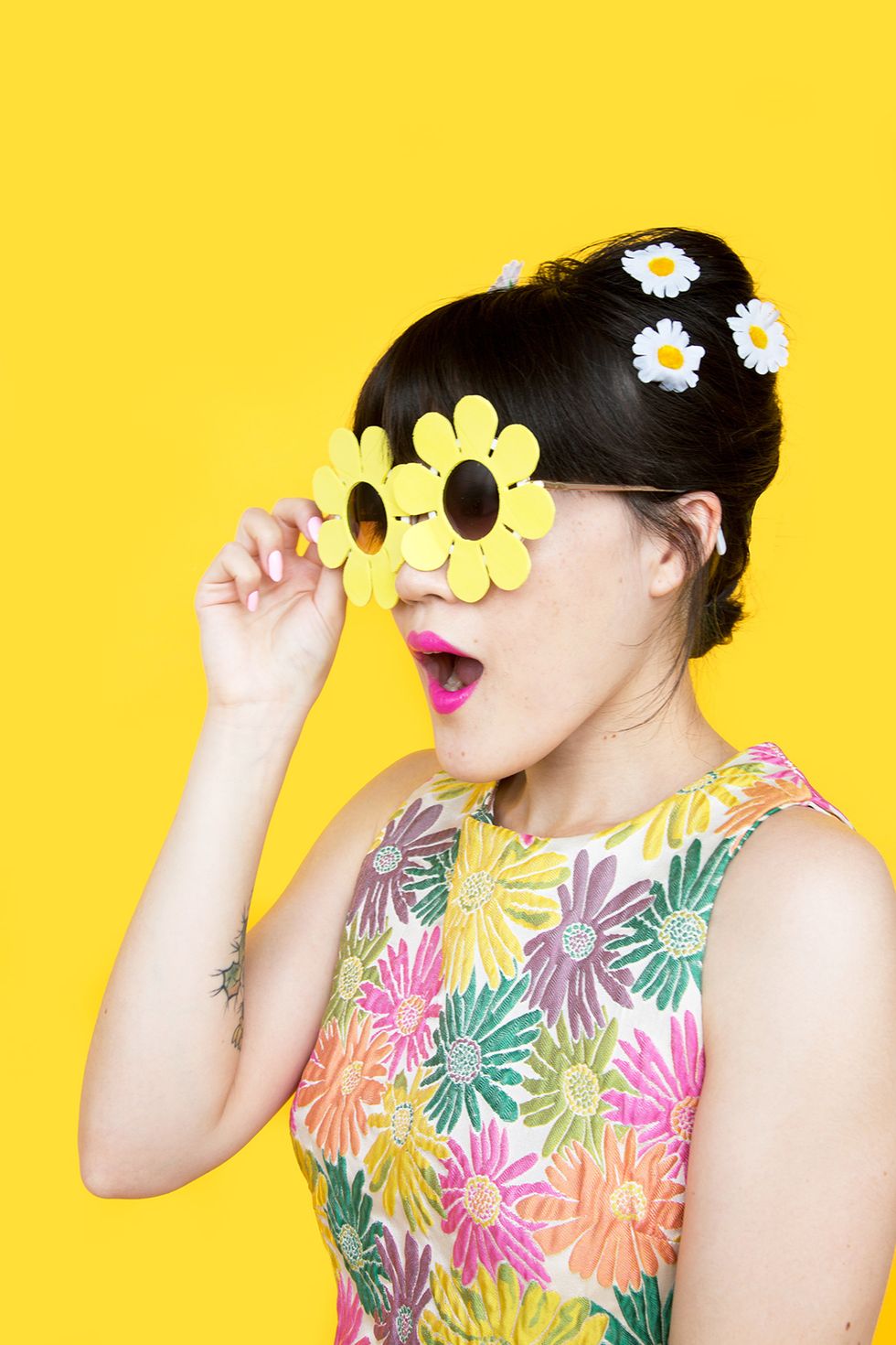 11. Wear Playful Sunnies: Make a statement while shielding your eyes from the sun. These springtime flower sunglasses easily transition to summer weather.