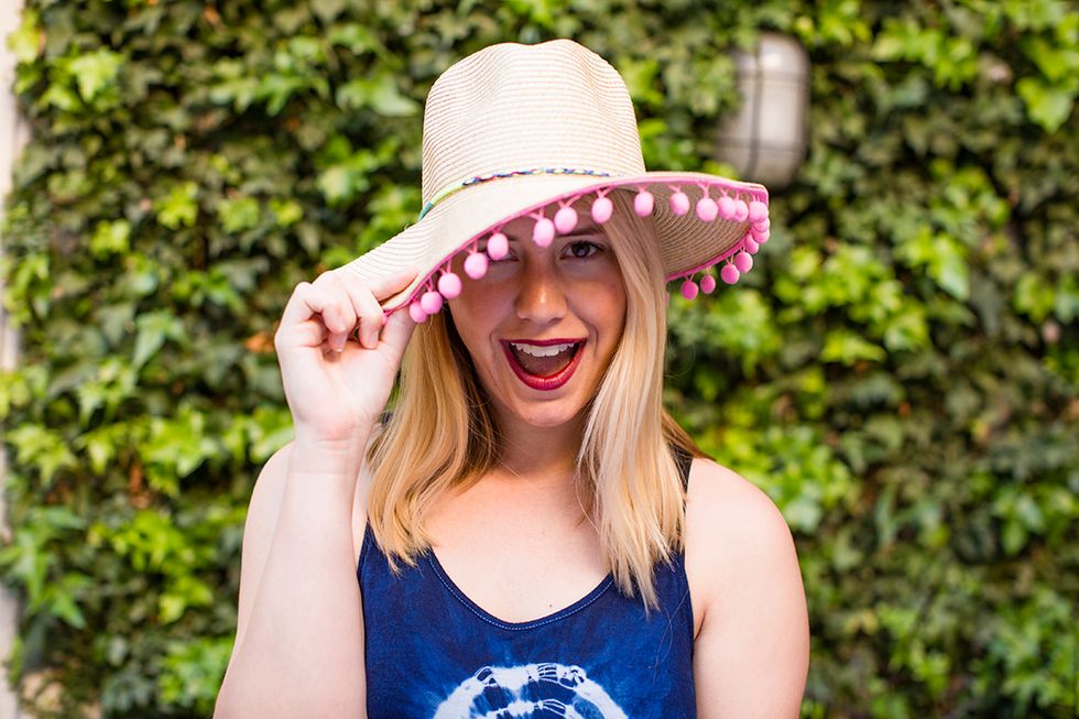 12. Make-Over Last Year\u2019s Straw Hat: Add some cute quirkiness to your basic straw hat by adding pom poms to the brim. Click here for the DIY: http://go.brit.co/1qm53vu