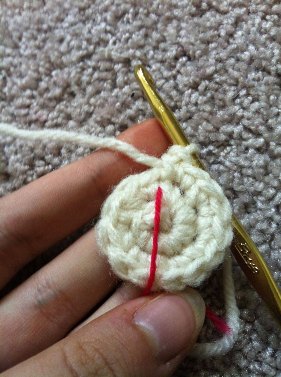 12 single crochet in your second round. (it can be a bit tricky the first couple if rounds but take care to catch both top loops of the previous round)