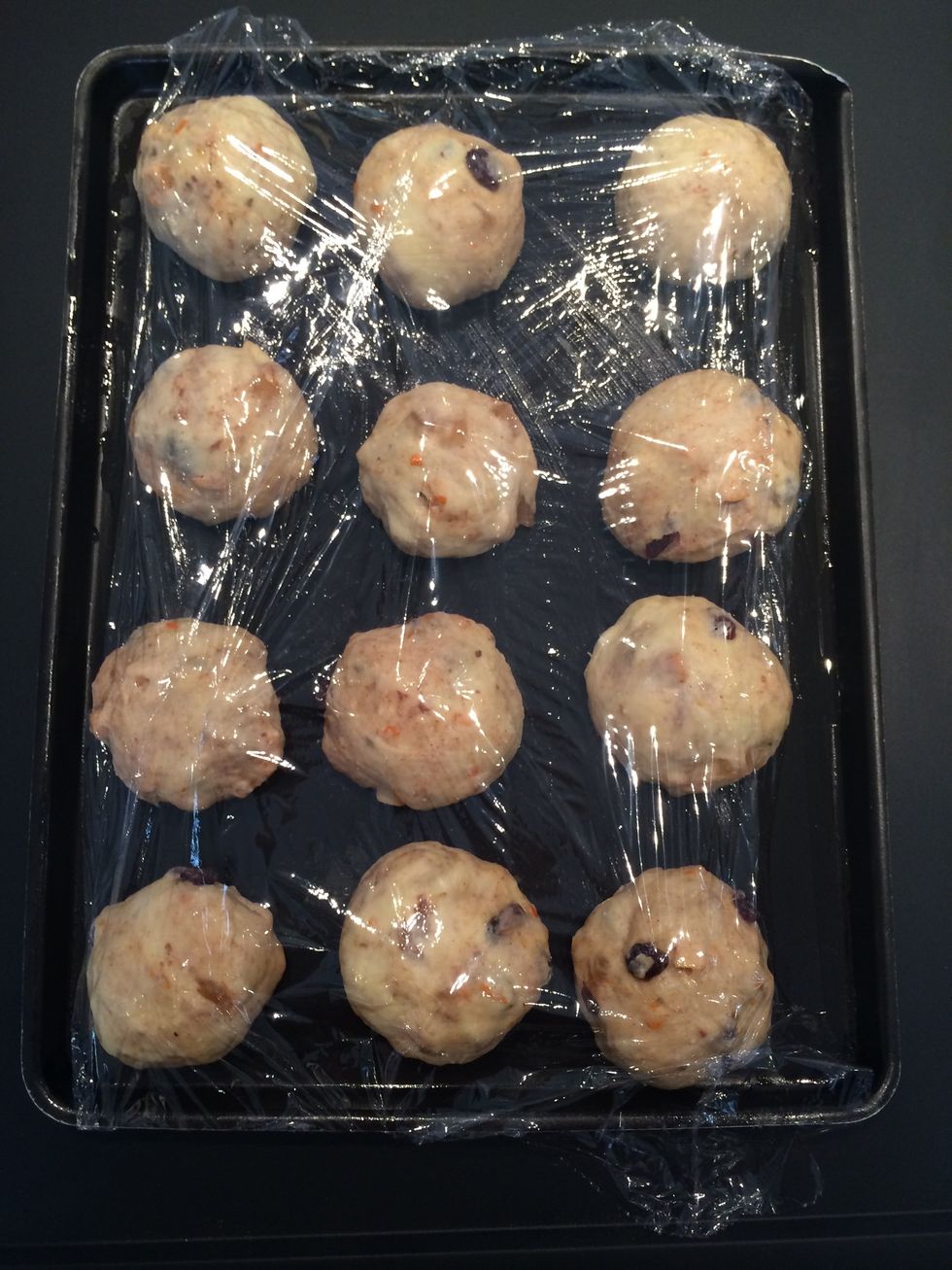 12 small buns. Cover and leave to rise again