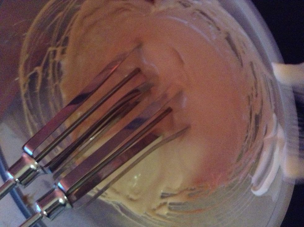 13.) Mix the cream and chocolate sauce with an electric hand mixer. The ending mixture does not have to be fluffy like and thick, mine was more liquidy, but both icing types are fine
