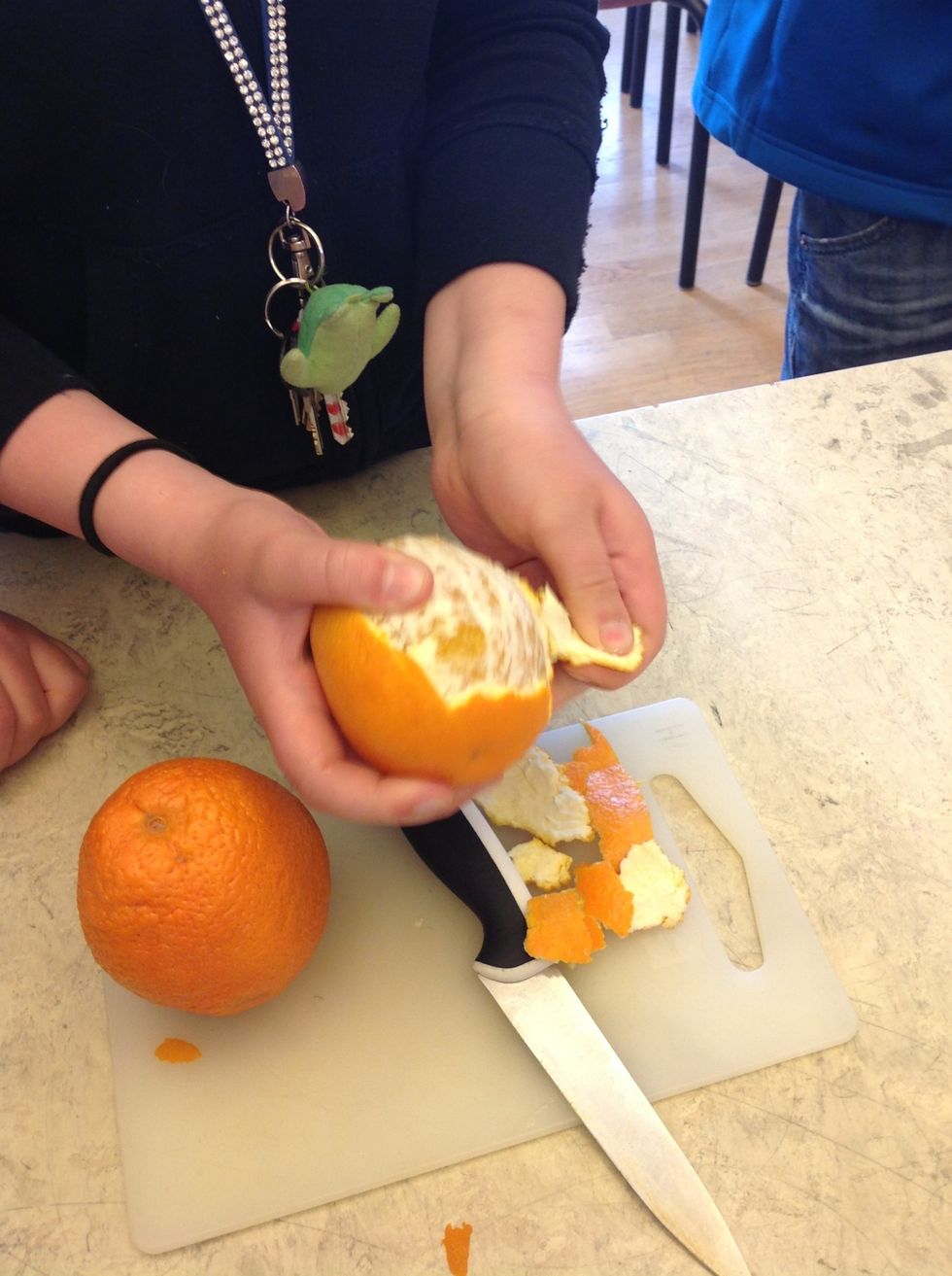 13. Peel the oranges.