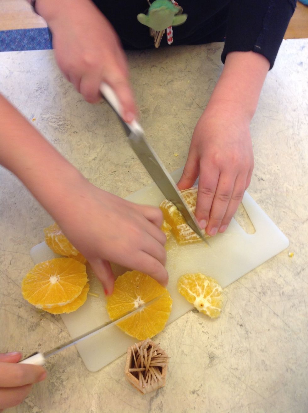 14. Cut the oranges into small pieces