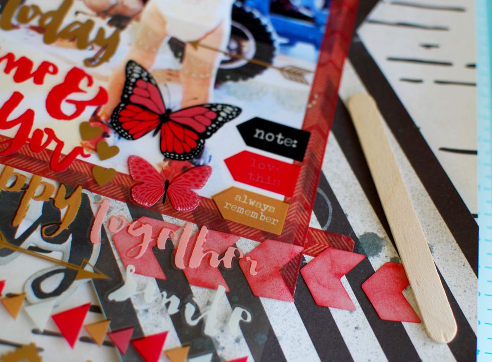 16.\tFind the rub-ons. It's easiest to cut out which designs you want, from the plastic sheet. This way you won\u2019t accidentally rub any other designs as well. I chose the Note and Love This rub-ons.
