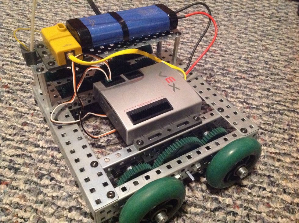 17. Connect the plugs on the motors to Motor Ports 2 and 3 on the PIC Microcontroller. Plug in the Robot Battery to the Microcontroller as well as the receiver to its appropriate location.