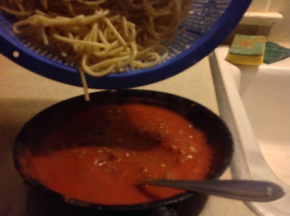 17, Get the Colander and pour plenty of Spaghetti in the Frying Pan