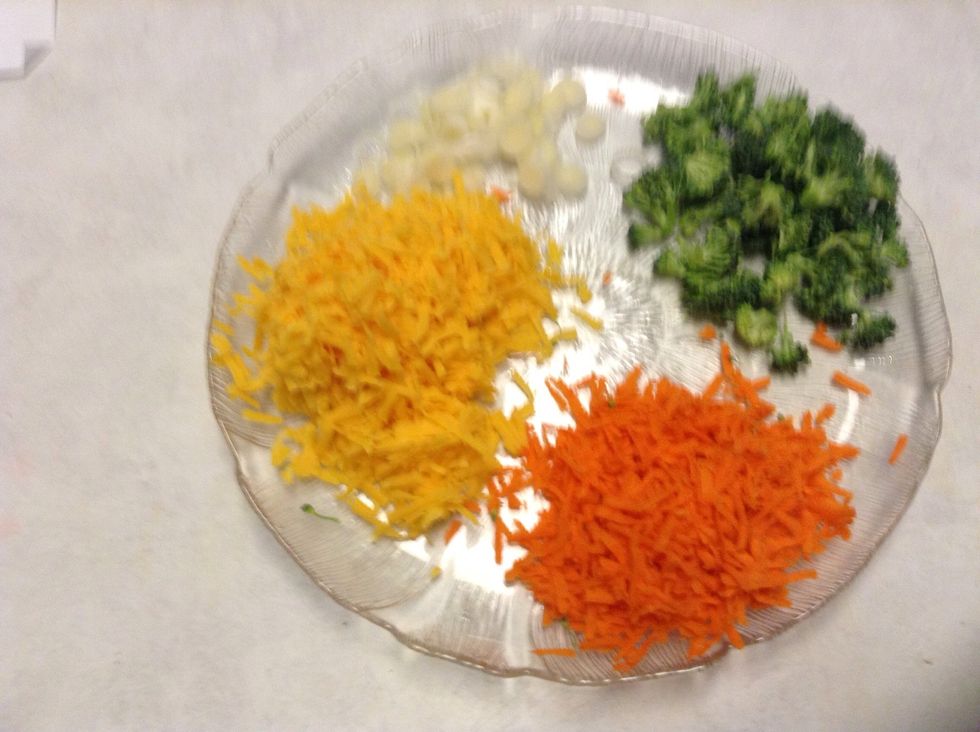 1c. shredded cheese, 1 c. fresh chopped broccoli, 1 c. chopped green onions, 1 c. shredded carrots. You can add other vegetables if you would like.