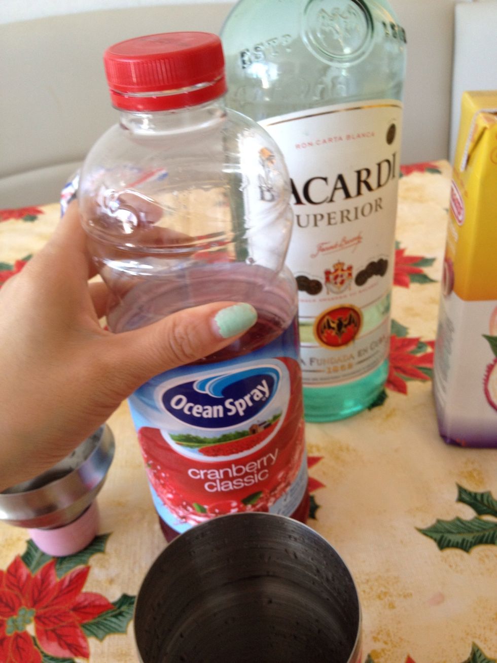 1oz of cranberry juice or 1/2oz strawberry juice