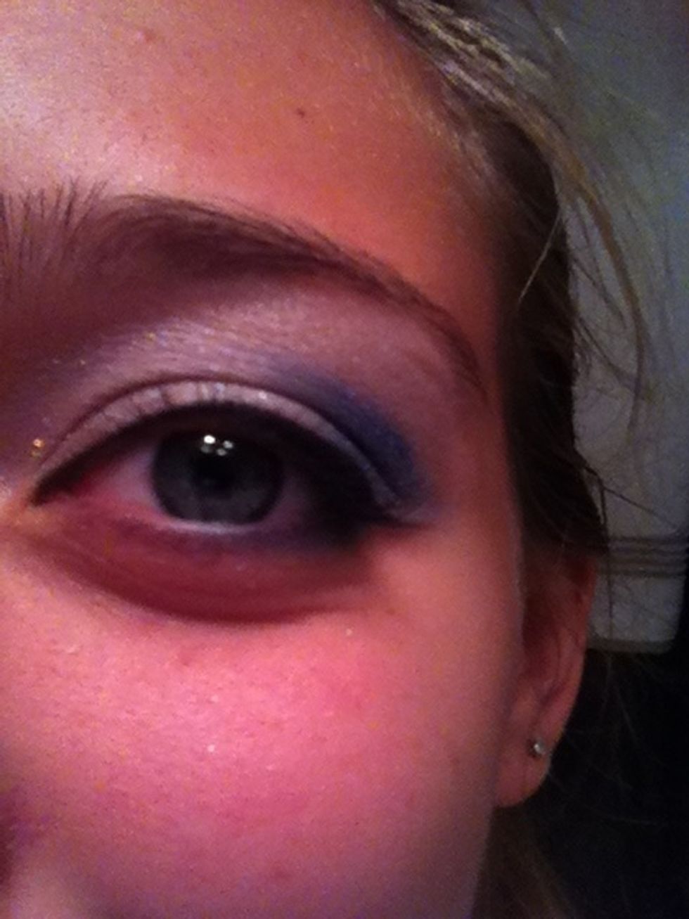 1st I apply the eye liner on the top going from the outer corner in. (gradually becoming smaller toward the inner corner)