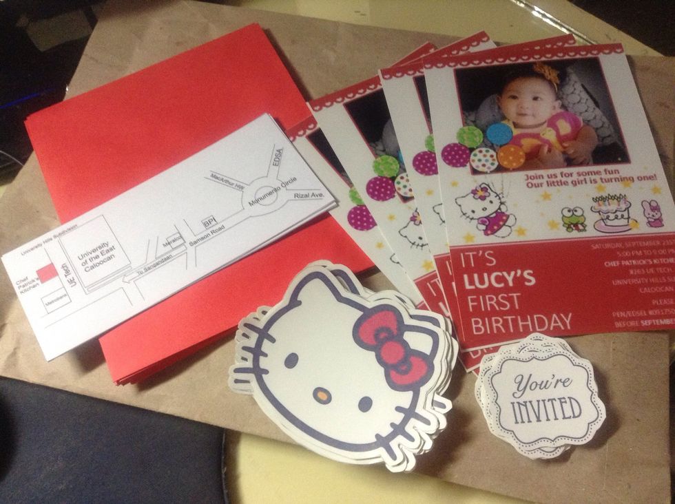 1st layout & design 4r photo invitation of your choice using PSD(Photoshop or Corel). Layout your location map for your venue. Choose a hello kitty clip art design you want for your colored envelope.