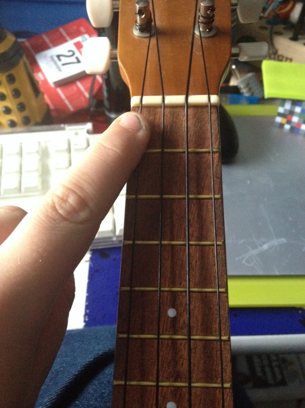 1st string. (Bottom) A string.