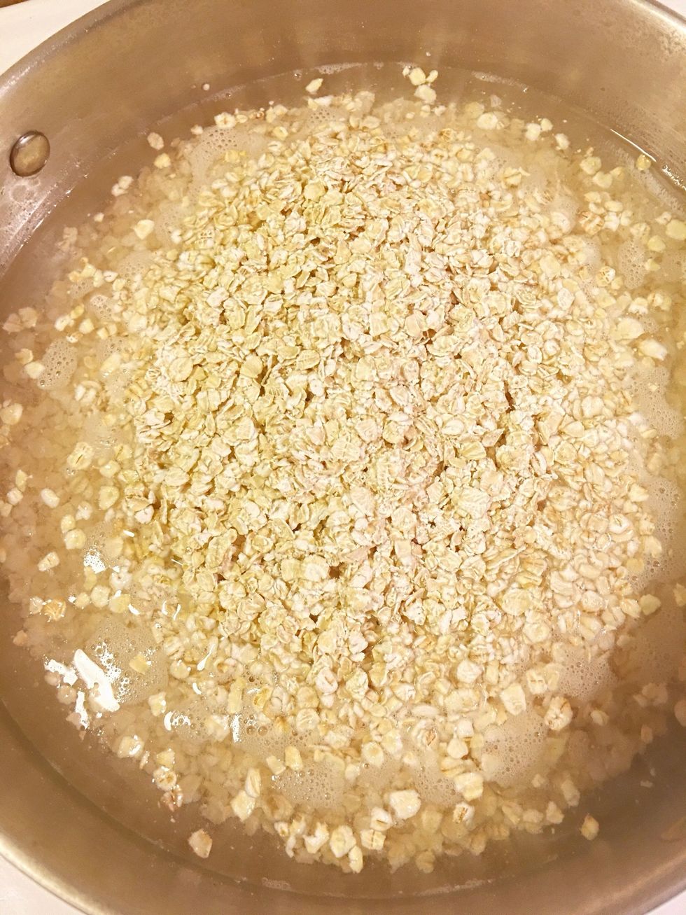 2 1/2 cups of oats. Cook according to packaging.