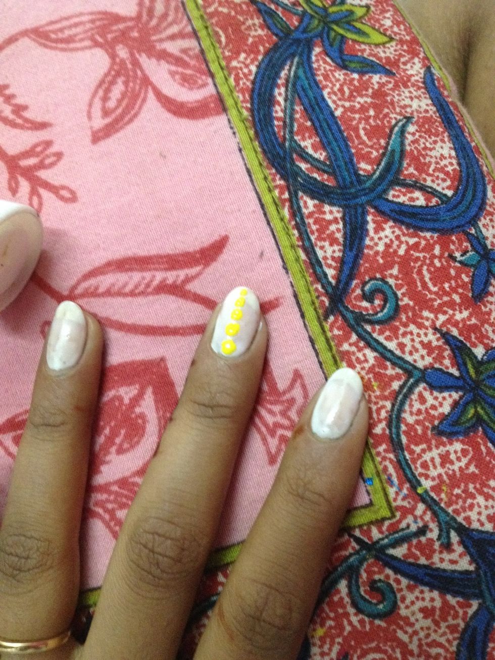 2.apply a base.let it dry.start making dots in a straight line goin from bigger to smaller in size