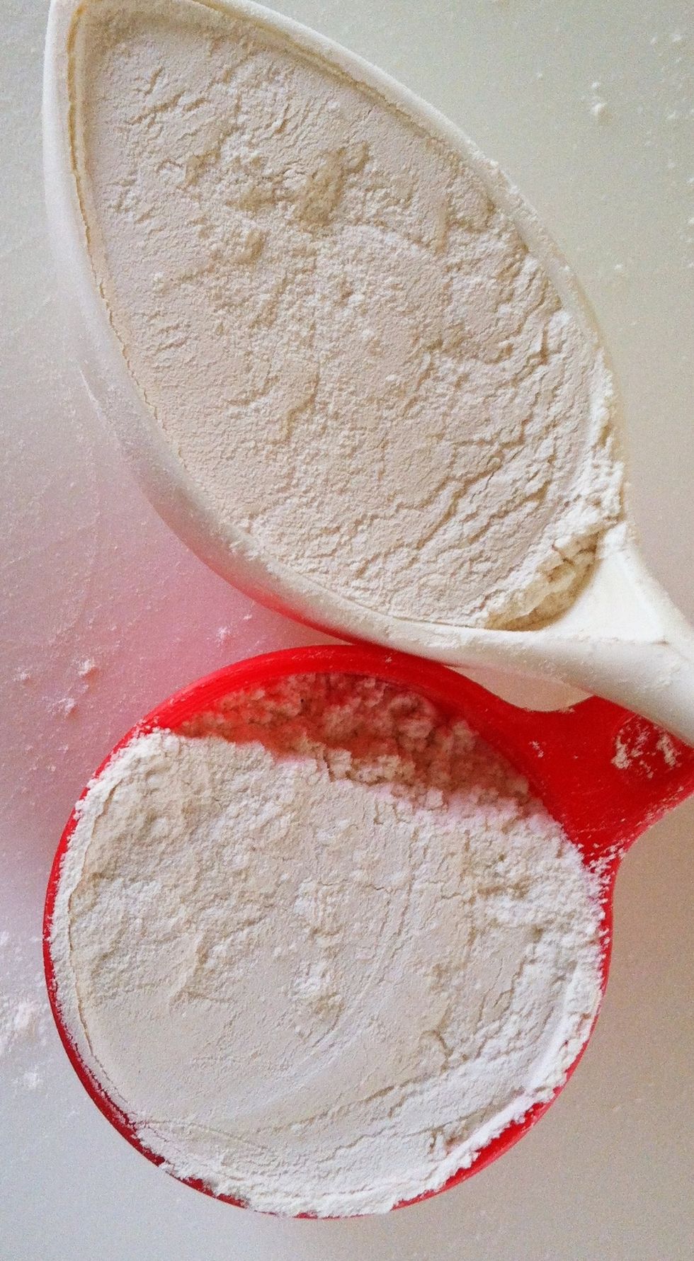 2 cups of flour. Remove 2 tablespoons and set aside for later. Place in food processor. Preheat oven to 400 degrees.