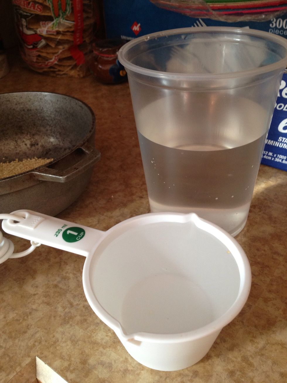 2 cups of water, I like to add a dash more for more fluff to my quinoa